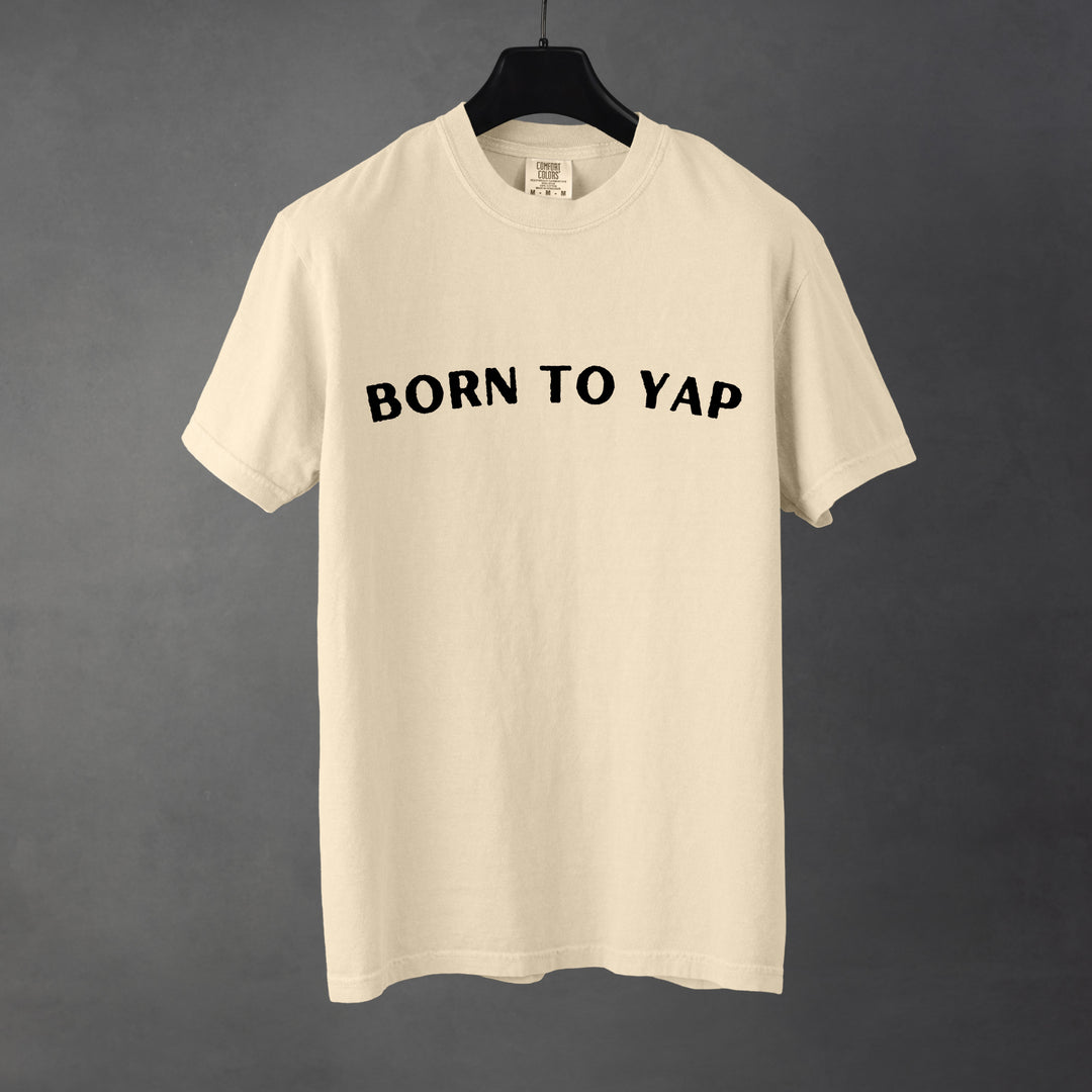 Sarcastic funny ivory graphic t-shirt with bold text saying 'Born to yap'