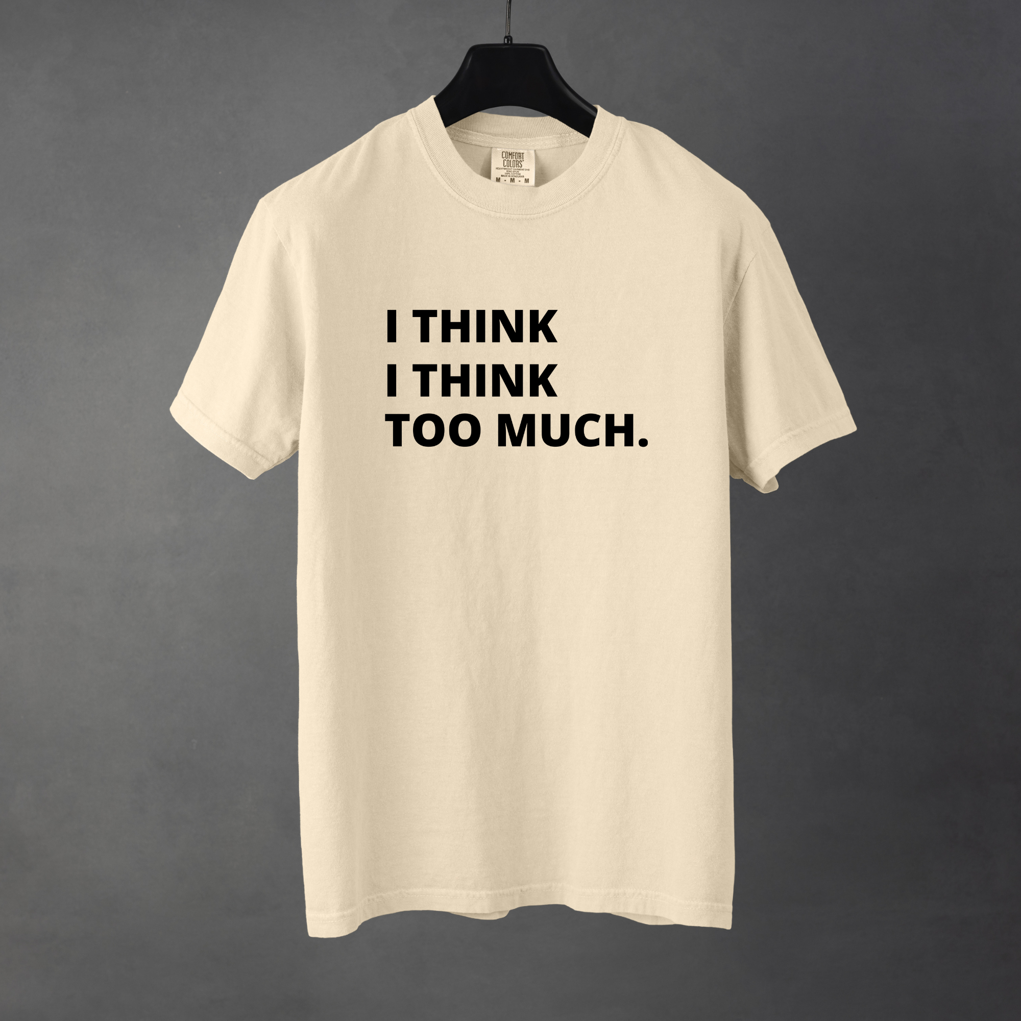 Sarcastic funny ivory graphic t-shirt with bold text saying 'I Think I Think Too Much'