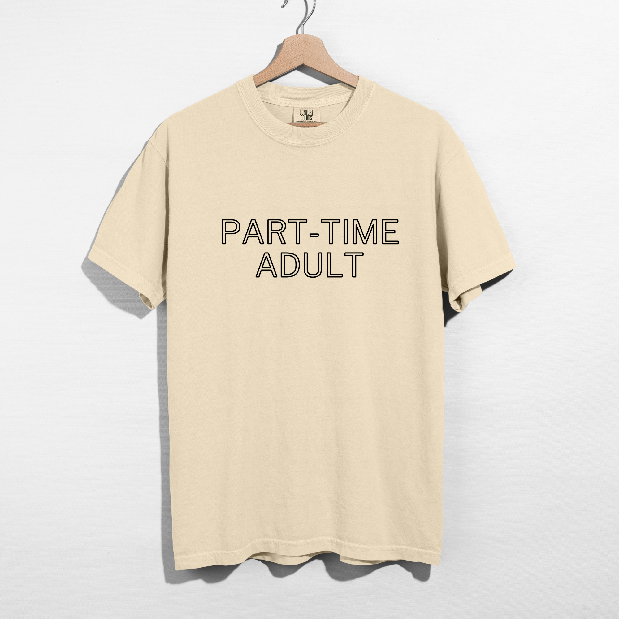 Sarcastic funny ivory graphic t-shirt with bold text saying'part-time-adult'