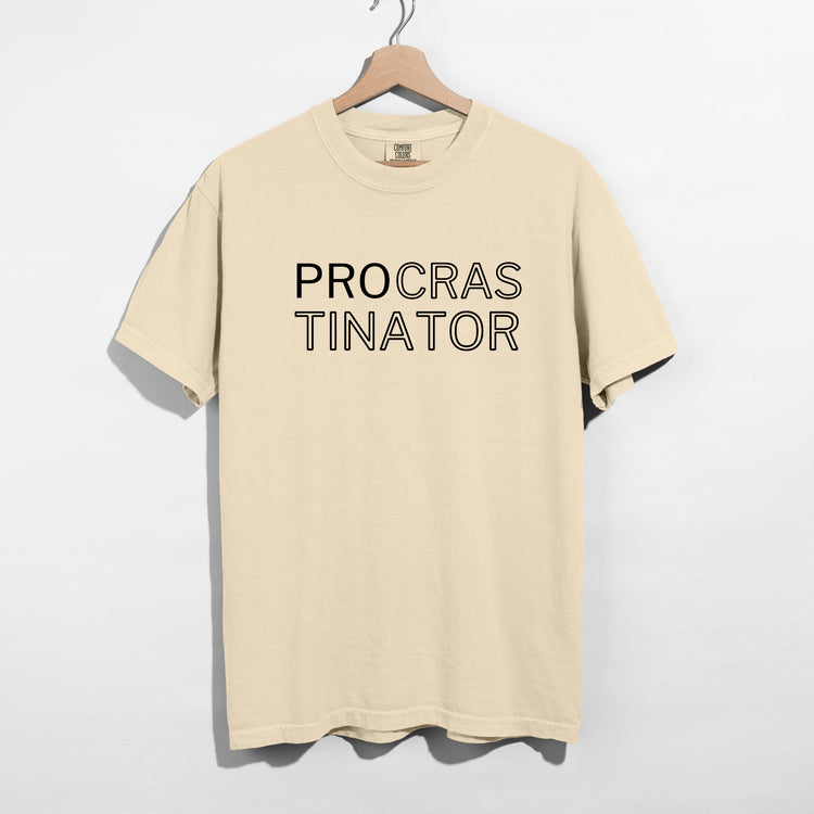 Sarcastic funny black graphic t-shirt with bold text saying 'Procrastinator'