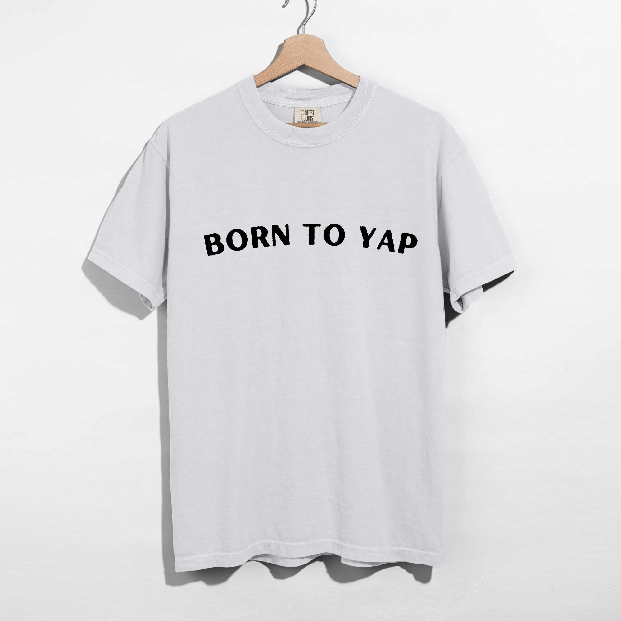 Sarcastic funny white graphic t-shirt with bold text saying 'Born to yap'