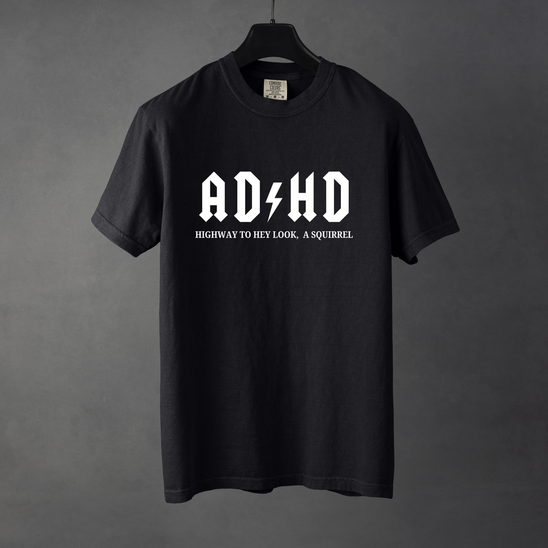 Sarcastic funny black graphic t-shirt with bold text saying 'ADHD highway to hey look a squirrel'