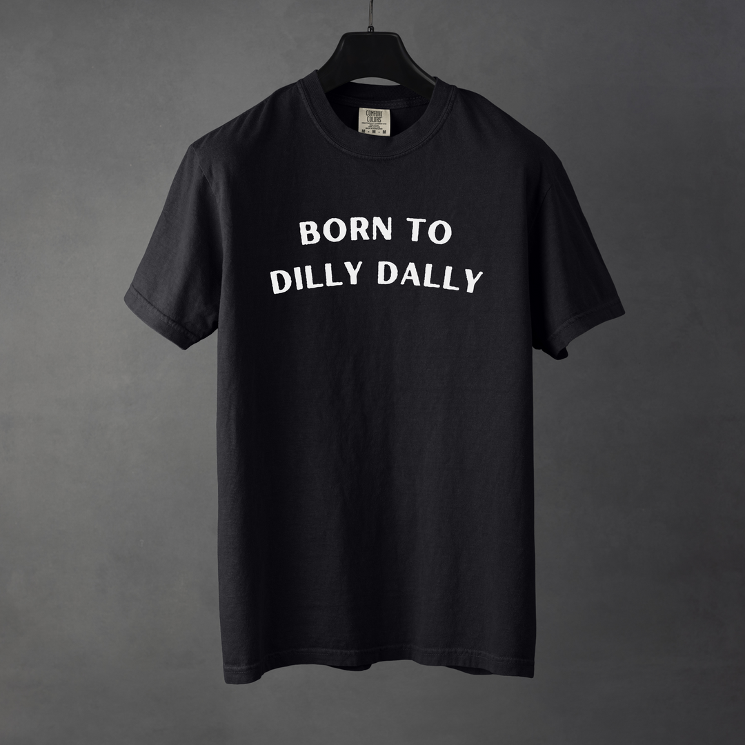 Sarcastic funny black graphic t-shirt with bold text saying 'Born to Dilly Dally'