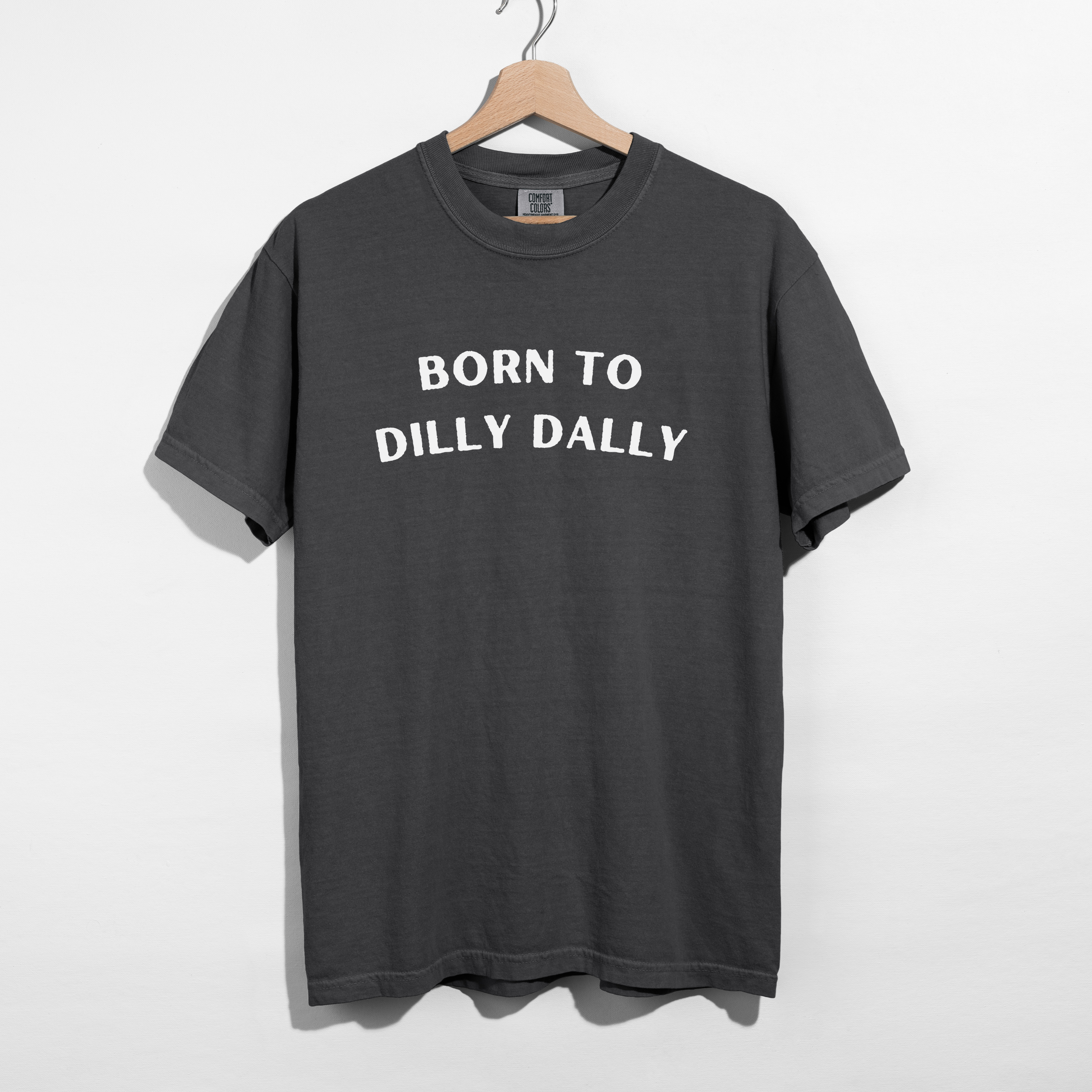 Sarcastic funny gray graphic t-shirt with bold text saying 'Born to Dilly Dally'