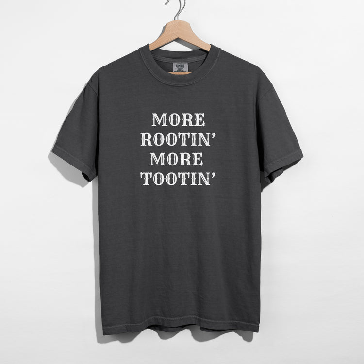 Sarcastic funny gray graphic t-shirt with bold text saying more rootin' more tootin'