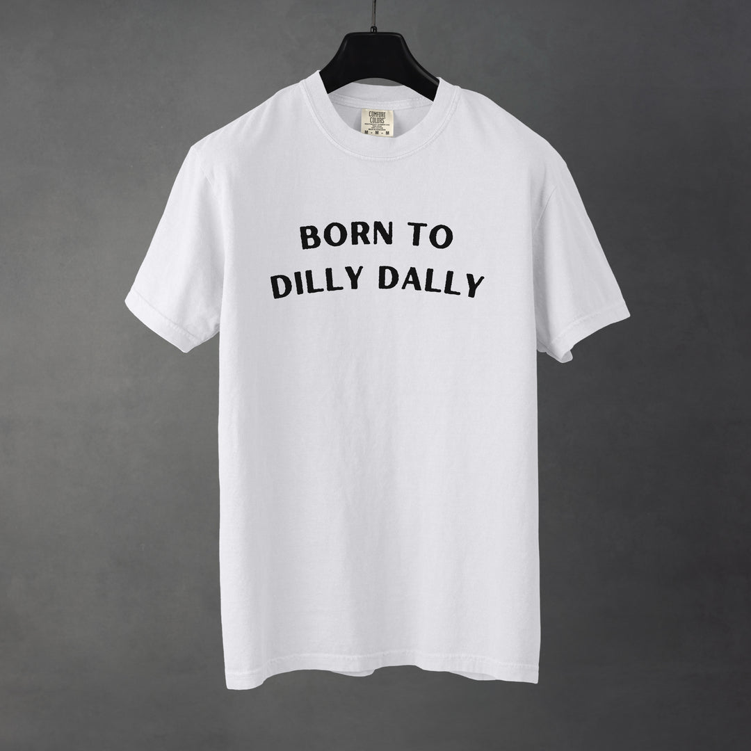 Sarcastic funny white graphic t-shirt with bold text saying 'Born to Dilly Dally'